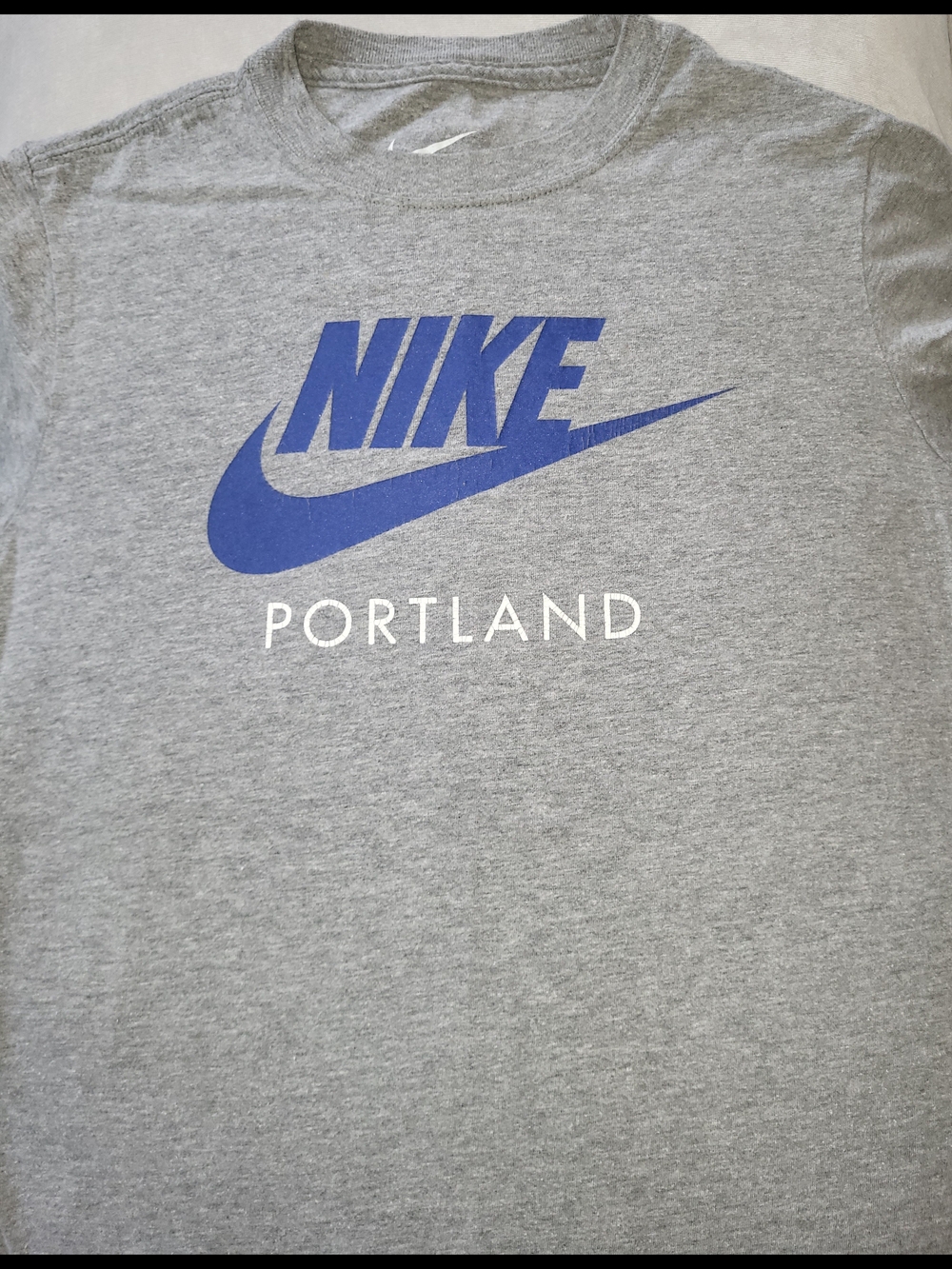Nike Gray T-Shirt with Blue Swoosh and Portland Text